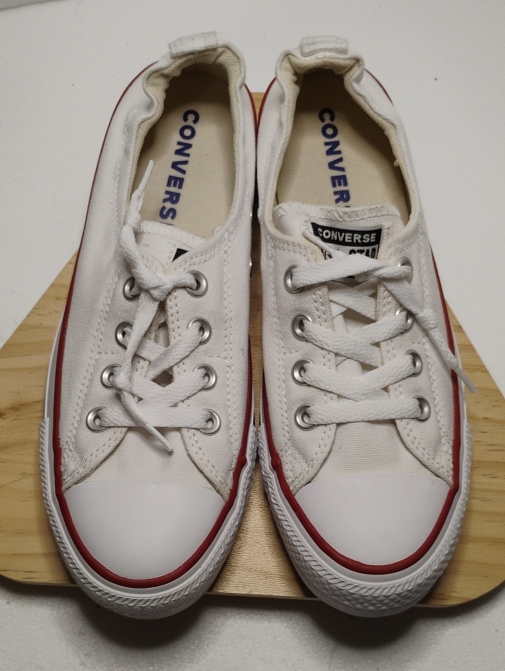 Converse Women Low Top Canvas Sneakers in White with Red Trim